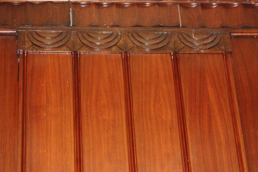 Courtroom wall paneling fluted with scallop ornamentation.
