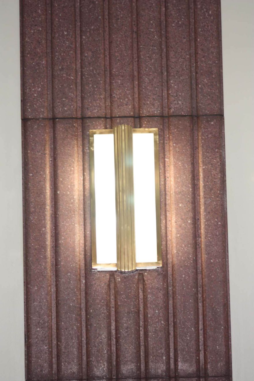 Original wall sconce with Art Deco banding in Council Chamber.