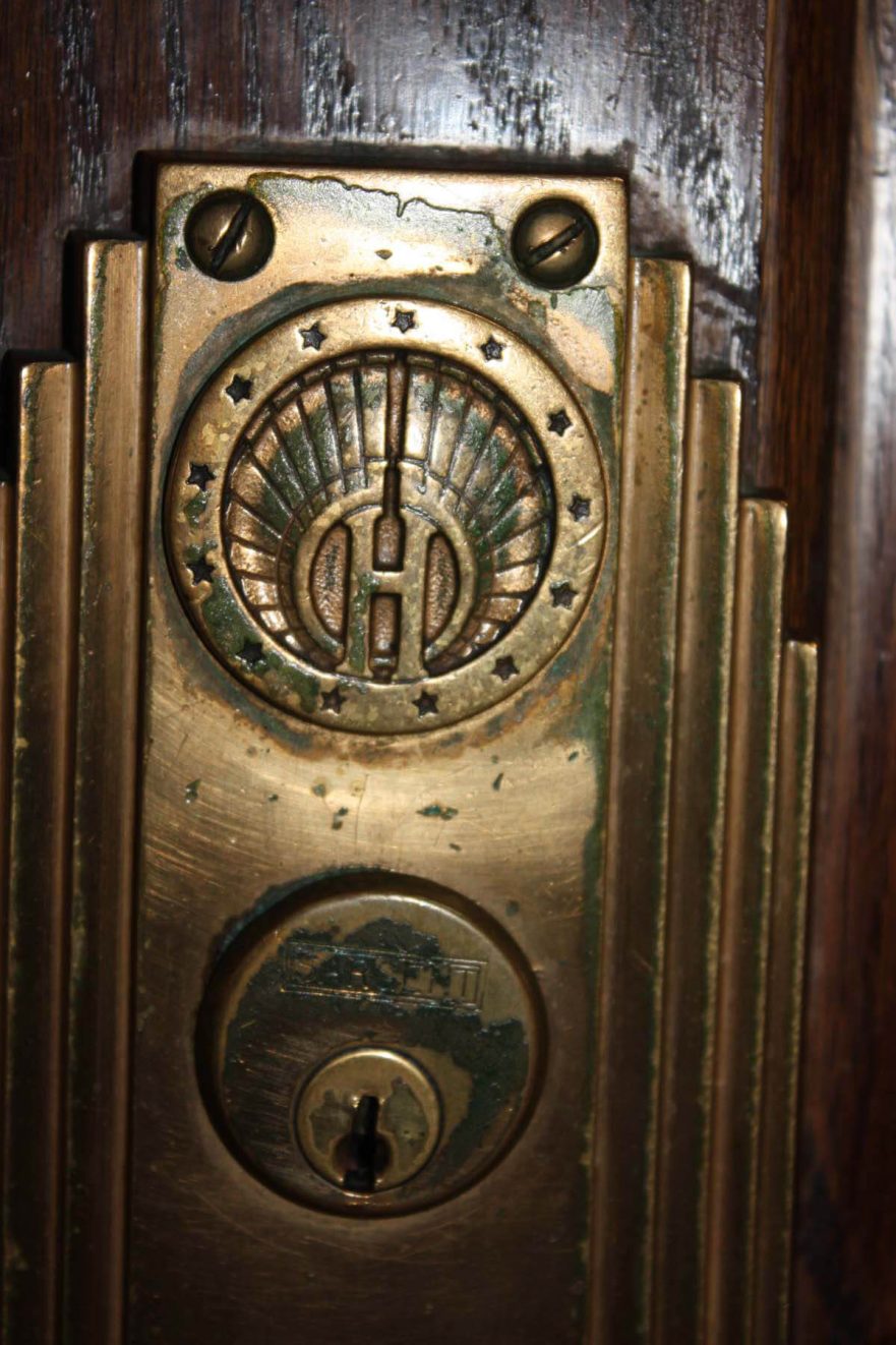 One of the many lock sets throughout city hall, note the city emblem is emblazed on it.