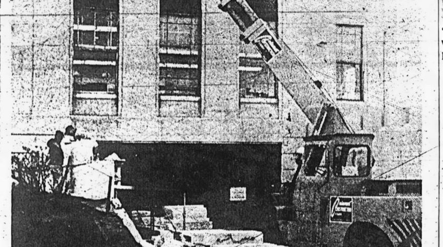 Workmen laid stone walls to extend the north side of Hammond City Hall for an expanded police lockup and additional office space, circa 1968.