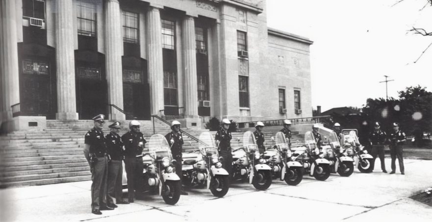 Police inspection in front of City Hall, circa 1971.