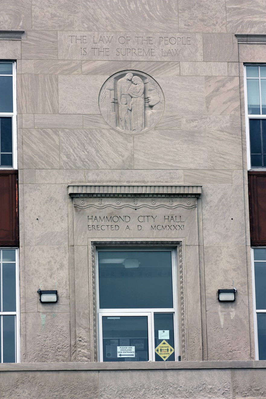 East entrance to City Hall, note the carvings around and above the door, circa 2022.