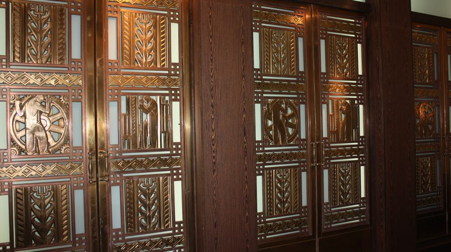 Six original Iannelli bronze doors that once hung on the main entrance to Hammond City Hall, now on permanent loan to Purdue University Northwest.