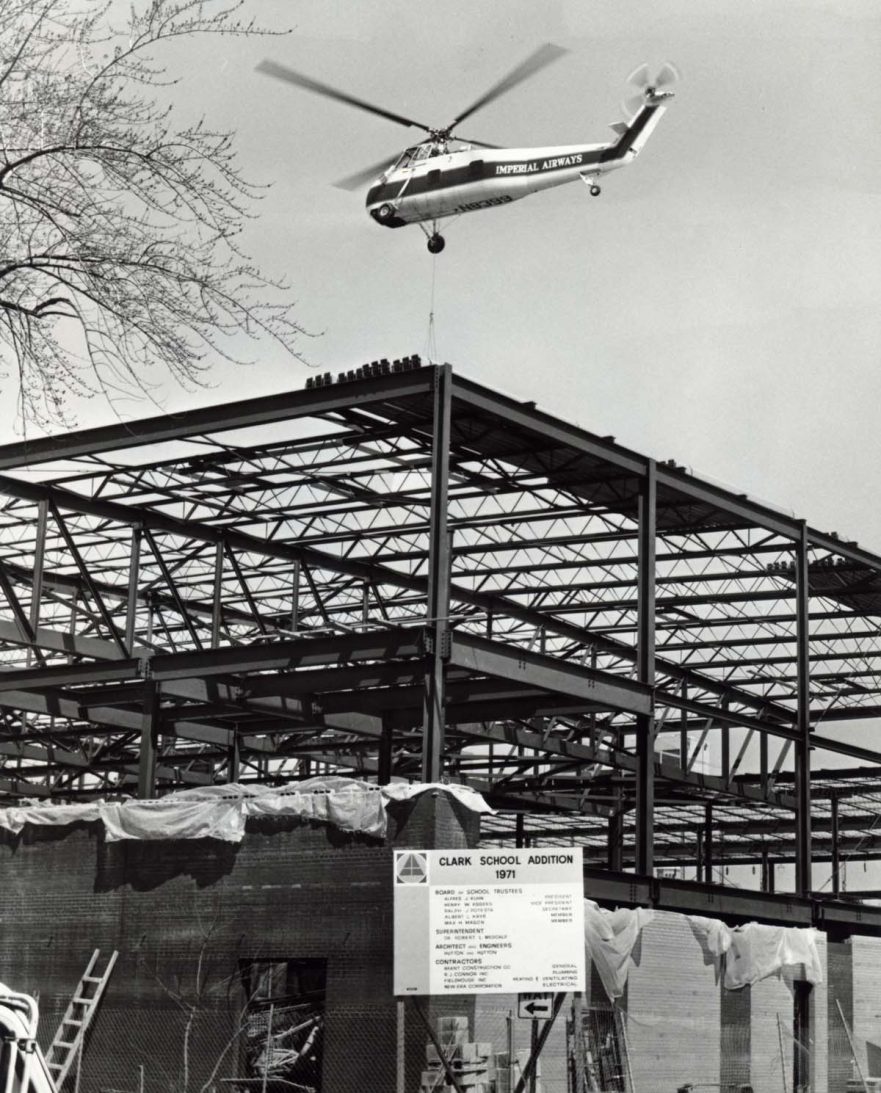 Helicopter delivering HVAC to the 1971 addition