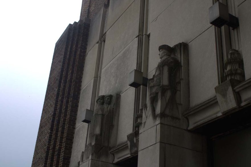 Figures above the north entrance on 119th Street in the 1938 addition, circa 2021