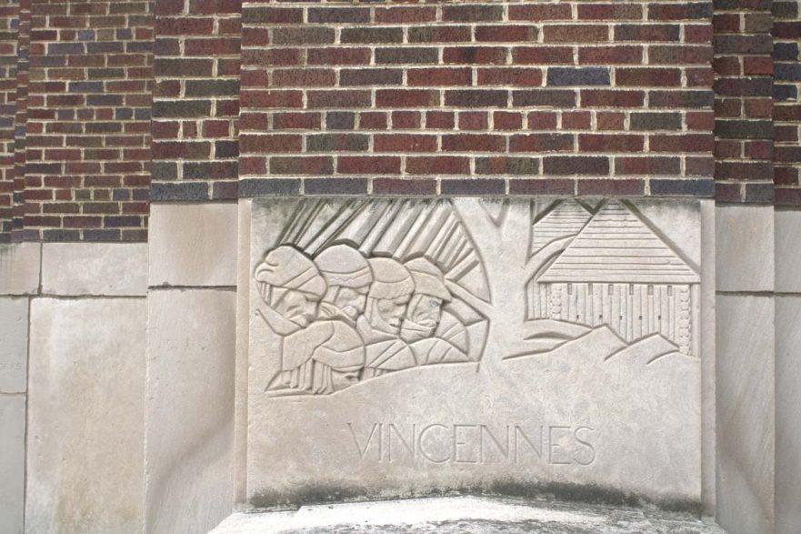 Relief depicting Vincennes set into the north entrance on 119th Street in the 1938 addition, circa 2021